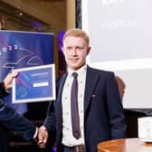 Ray Hill (right) receives his award from Tom Bridge, Operations Director of First West Yorkshire