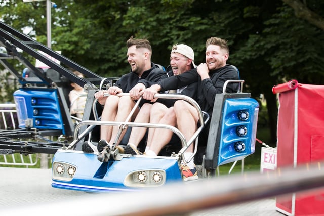 Jordan Trowell, Liam Paisley and Dean Robertshaw take a spin on one of the rides
