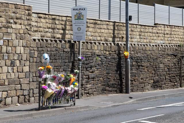 Tributes have been laid at the scene of the accident on Burnley Road