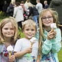 Freya Burgin, eight, Elijah Burgin, four, and Sophia Newsome, nine, enjoying ice-creams at Halifax Gala on Saturday