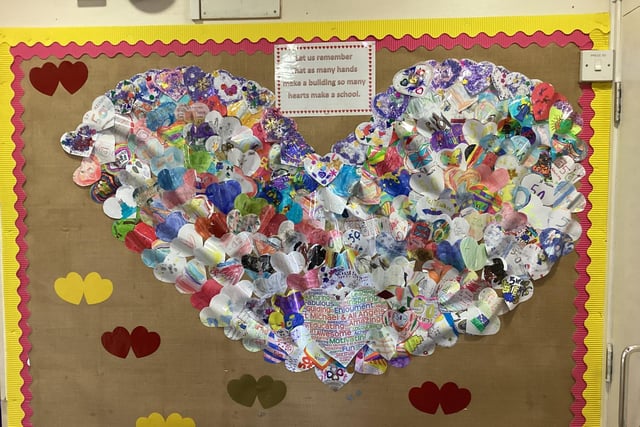 A heart display made by pupils from St Michael & All Angels Primary & Pre-School