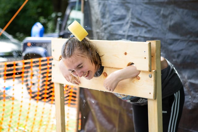 Katie Rayner in the stocks for Brighouse Tykes and Explorer Group