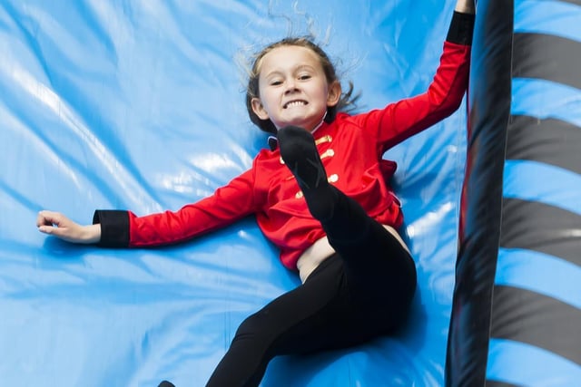Hannah Edon, seven, on an inflatable slide.
