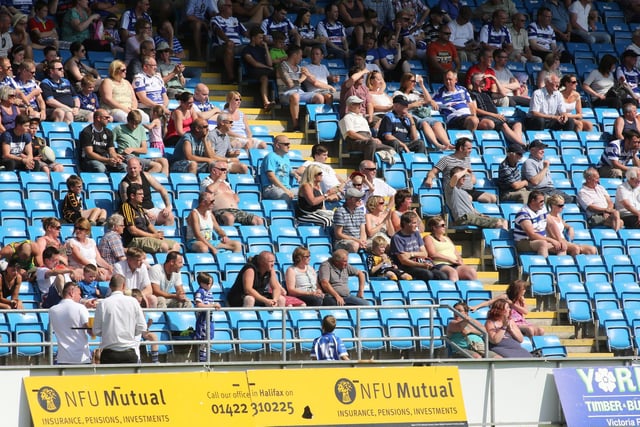 Halifax RLFC fans enjoy the sunshine at the Shay during the 50-18 win over Whitehaven. Picture: Jim Fitton
