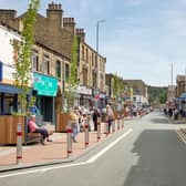 The current view of Commercial Street in Brighouse, including a parklet