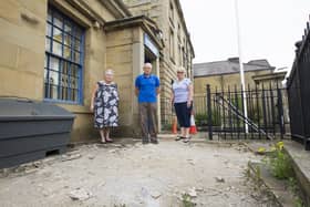 With the area flagstones were stolen from at Halifax Royal British Legion, from the left, Pauline Dawson, Michael Green and Susan Green.
