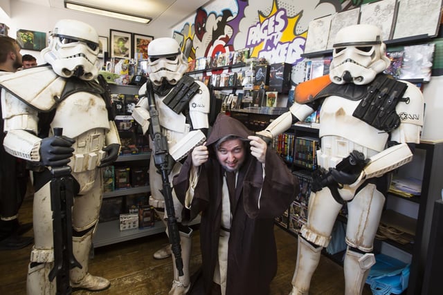 Ross Denby, who runs Pages N'Pixels, with some of the stormtroopers.