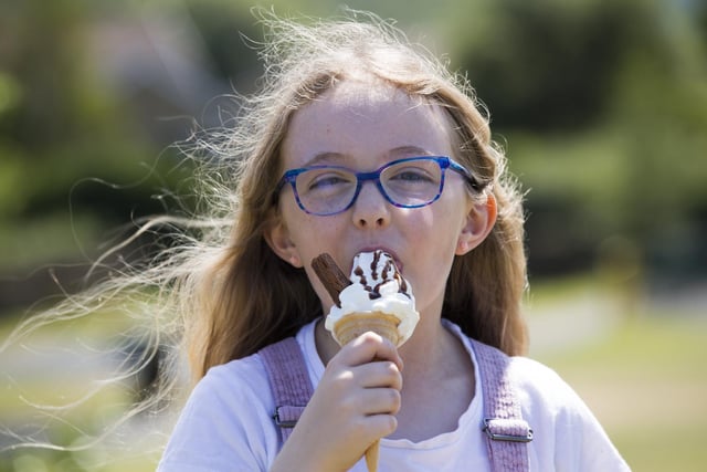 Ava Smith, nine, enjoys an ice-cream.