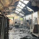 The damage left by the fire at Gordon Riggs yesterday