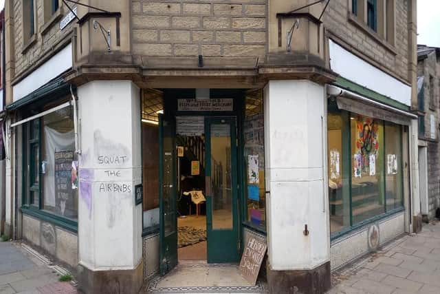 What was a greengrocers in Hebden Bridge town centre has been taken over by squatters