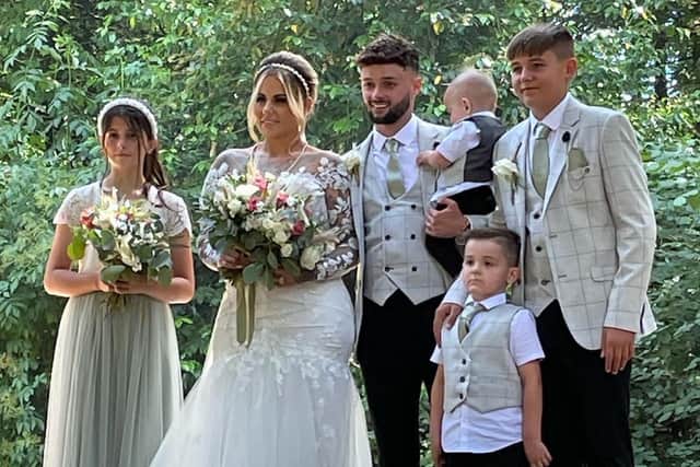 The family on the couple's wedding day