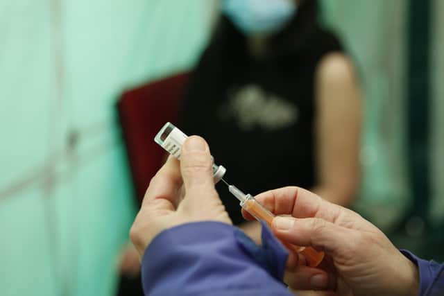 A coronavirus vaccine. (Photo by Hollie Adams/Getty Images)
