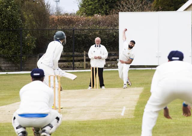 Cricket - Shelf Northowram Hedgetop v Mytholmroyd. Taufeeq Ahmed bowls for Mytholmroyd.