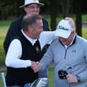 Frank Greaves, left, congratulating Lee Rowbotham after the latter holed the putt that secured victory over York and the YIDU title in September 2019.