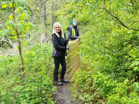 Volunteers lend a hand to clean up by Elland riverside