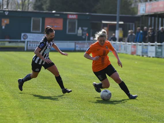 Ami Woodruff in action for Town in last season's 3-0 victory over Newcastle United in the Vitality Women's FA Cup.
