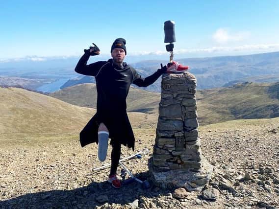 Ben Lovell who can only walk for 20 minutes at a time has climbed England's three highest peaks