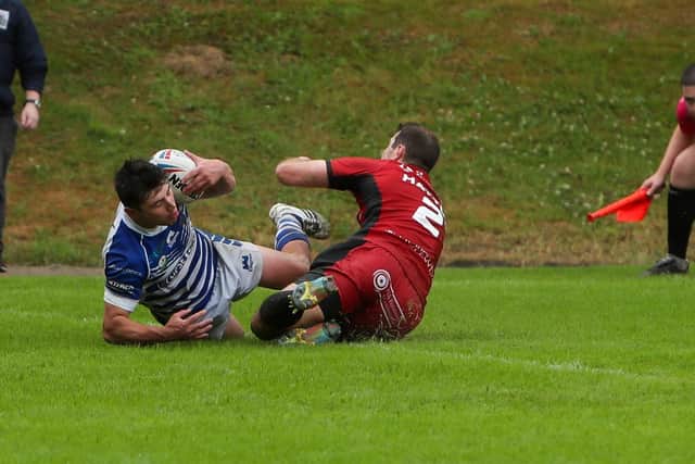 Try-line action at The Shay where a last-minute drop-goal clinched the win for Halifax Panthers over Widnes Vikings. Picture: simonomhrugbypics.