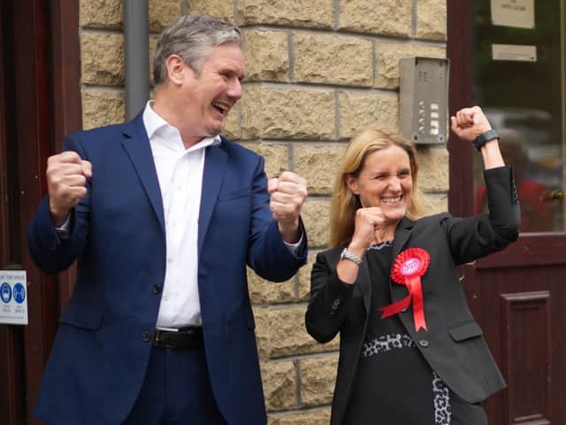 Labour leader Sir Keir Starmer celebrates with Kim Leadbeater after her victory in the Batley and Spen by-election