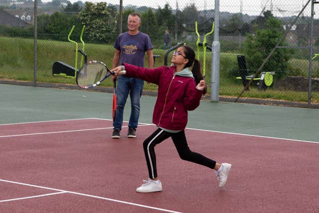 MP Holly Lynch opens new tennis club at the Hough, Northowram. Pictured is Samara Ravat