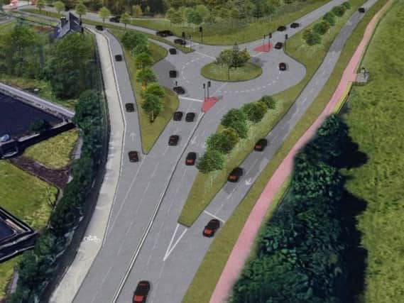 An artist’s impression of how the Cooper Bridge roundabout could look after a major remodelling designed to cut congestion at the notorious bottleneck. (Image: Kirklees Council)