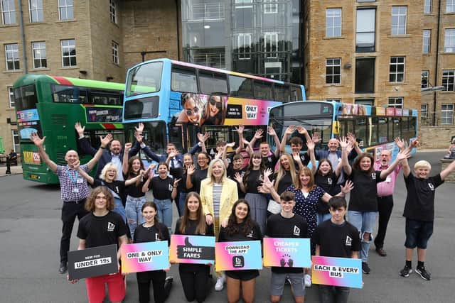 Mayor of West Yorkshire Tracy Brabin (centre) joins young people and transport leaders at Dean Clough in Halifax to celebrate the launch of a new deal on bus travel for Under 19s across West Yorkshire
