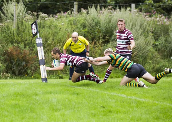 Rugby Union - Old Rishworthians v Littleborough. Luke Sutcliffe touches down for Rishworthians.
