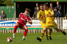 Jamie Cooke in action for Colne