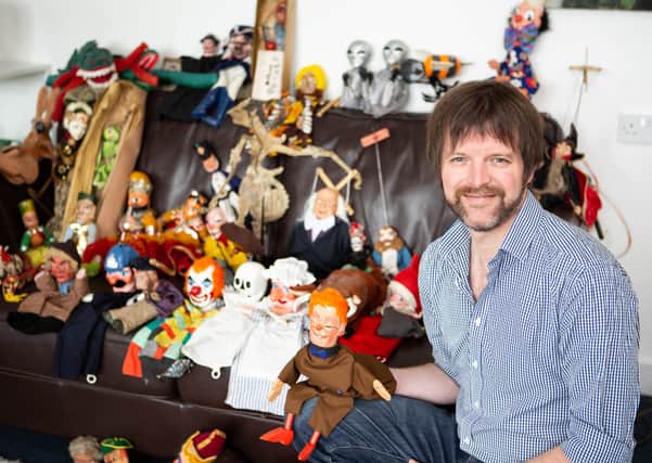 James Watson, with a rare puppet collection going up for auction at Halifax Mill Auctioneers