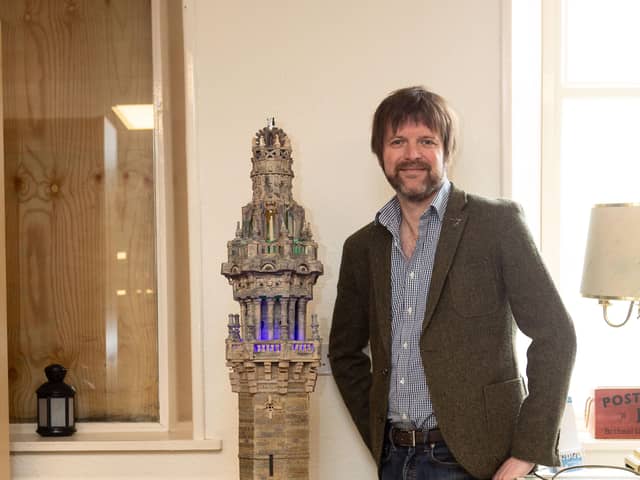James Watson, with the Wainhouse Tower replica, going up for auction at Halifax Mill Auctioneers