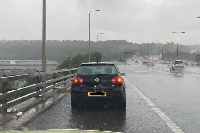 The VW Golf stopped on the M62