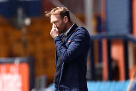 STOCKPORT, ENGLAND - MAY 16: Simon Rusk, manager of Stockport County reacts during the Vanarama National League match between Stockport County and Torquay United at Edgeley Park on May 16, 2021 in Stockport, England. Sporting stadiums around the UK remain under strict restrictions due to the Coronavirus Pandemic as Government social distancing laws prohibit fans inside venues resulting in games being played behind closed doors. (Photo by Jan Kruger/Getty Images)