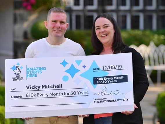 Halifax mother Vicky Mitchell, pictured with her partner, has spoken of the moment she realised she was 'Set for Life' with a win from The National Lottery (Picture by Anthony Devlin)