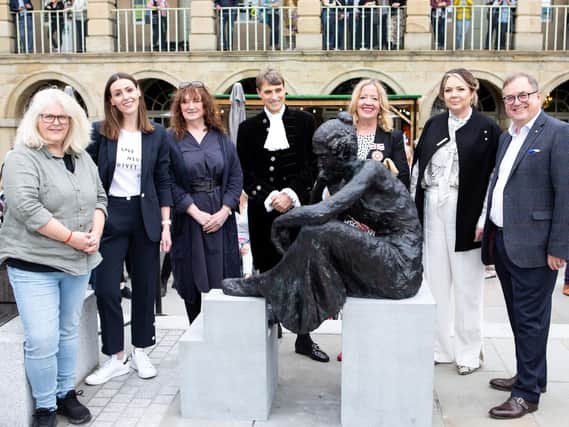 Sally Wainwright (far left) and Suranne Jones were among those at the unveiling of the statue today.