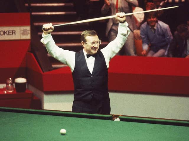 Dennis Taylor celebrates victory in the Embassy World Snooker Championship Final at the Crucible Theatre in Sheffield, England. Taylor beat Steve Davis 18-17 in a dramatic black ball finish. Credit: Adrian Murrell /Allsport