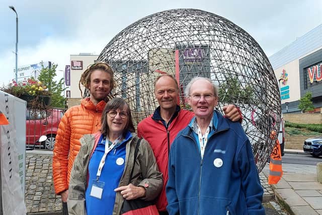 Arnd, Harry, Margaret and Geoff Barnes and the globe. Picture: Submitted