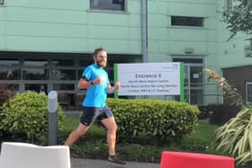 Alan running past Wythenshawe Hospital