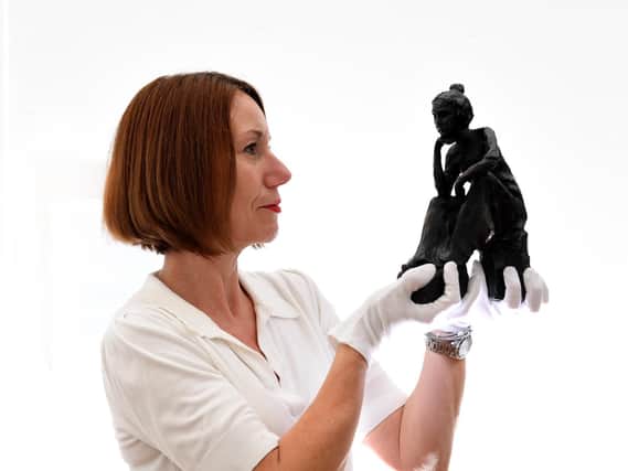 Mandy Whittaker with one of the maquettes