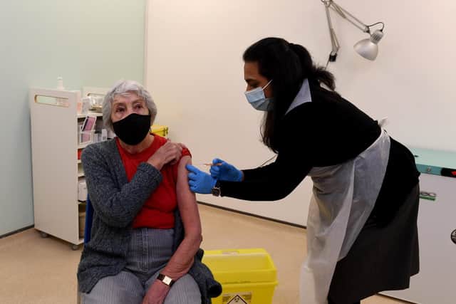 People in Calderdale are being urged to get their COVID-19 booster and flu jab
