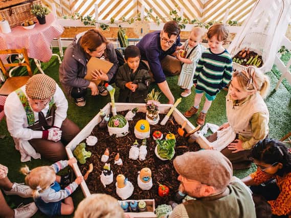 ‘Let’s Grow’ pop up allotment events, including vegetable garden and artwork murals.