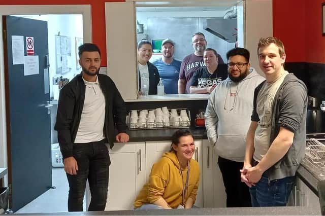 The Restart Scheme Calderdale volunteers in the kitchen at The Basement Project, front left-right, Umar Hussain, Francesca Carr, Adnan Khalid, Shaun Bramley.  Back row, Rebecca Kelly, Lawrence Dodding, James Beardsworth and Joanne Redfearn. Photo courtesy of Maximus UK