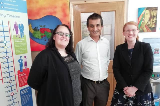 Sajeed Mahmood with Marie Mitchell from the Women's Activity Centre (left) and MP for Halifax Holly Lynch (right)