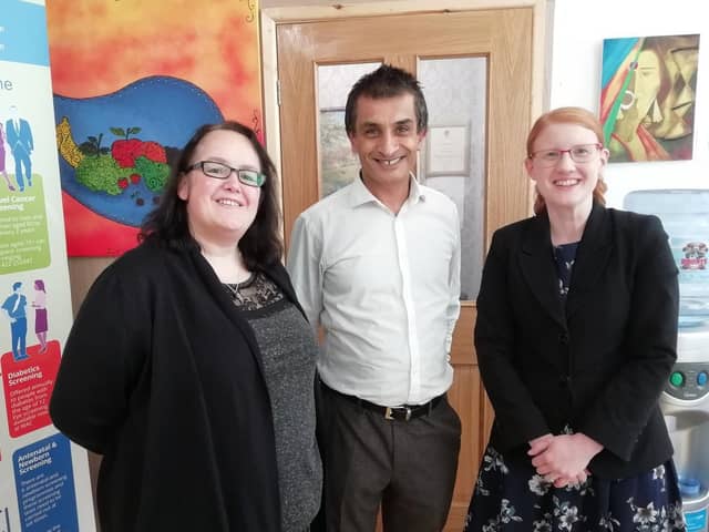 Sajeed Mahmood with Marie Mitchell from the Women's Activity Centre (left) and MP for Halifax Holly Lynch (right)