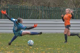 Brighouse Town's player of the match Drew Greene scores her first goal of the match in Sunday's big win over Leeds United U23s. Picture: Ray Spencer