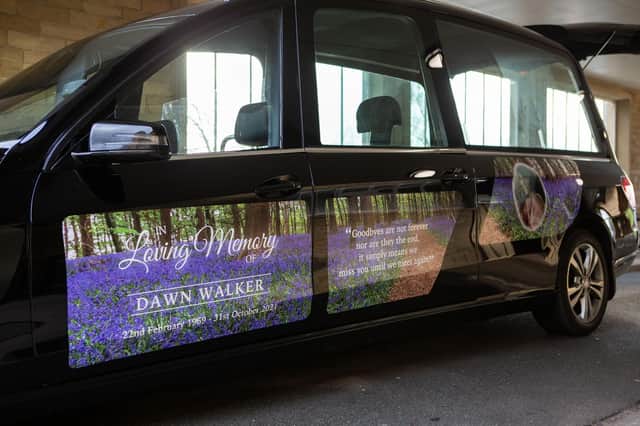 The funeral car with a message dedicated to Dawn.