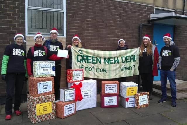 The Calderdale Green New Deal campaigners with their pile of presents.