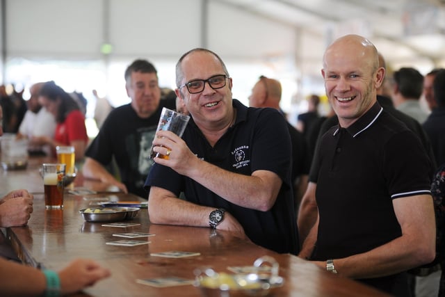 Peterborough Beer Festival 2019 at the Embankment.  Visitors to the event enjoying a glass EMN-190820-175813009