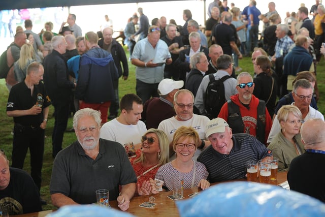 Peterborough Beer Festival 2019 at the Embankment.  Visitors enjoying a glass EMN-190820-175857009
