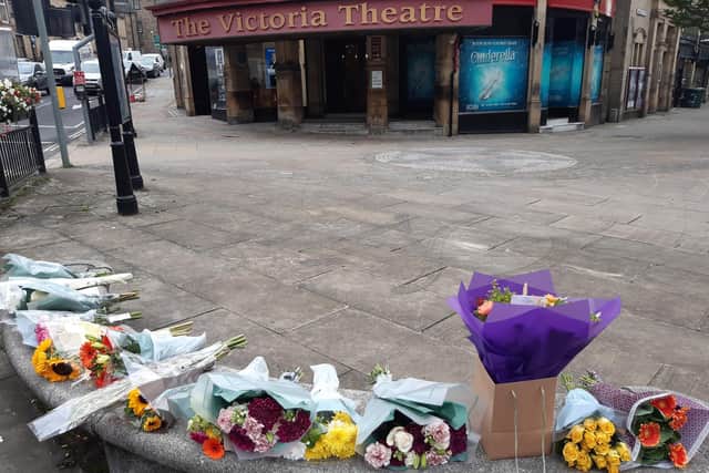 Flowers left for the two young men who died after being stabbed in Halifax town centre