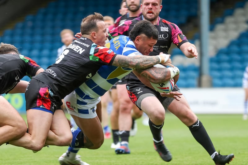Adam Tangata of Halifax scores a try on his 200th appearance
